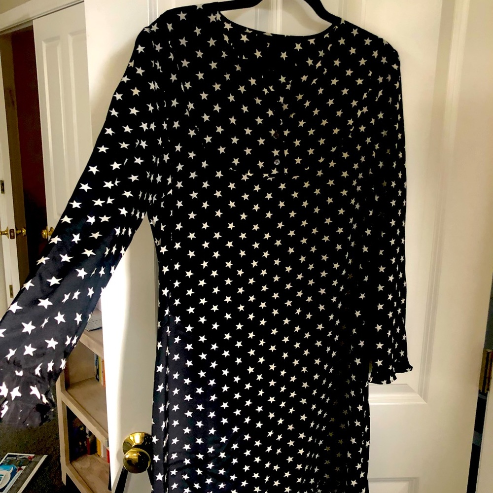 Polka Dot tunic dress. Above the knee,long sleeve. Looks great worn with belt.
